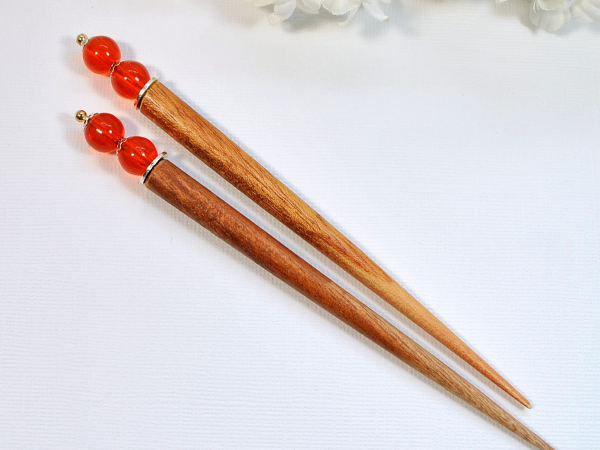 Pair of Minimalist Orange Hair Sticks, handmade by Purple Moon Designs