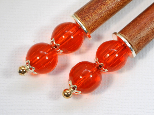 Pair of Minimalist Orange Hair Sticks, handmade by Purple Moon Designs