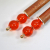 Pair of Minimalist Orange Hair Sticks, handmade by Purple Moon Designs